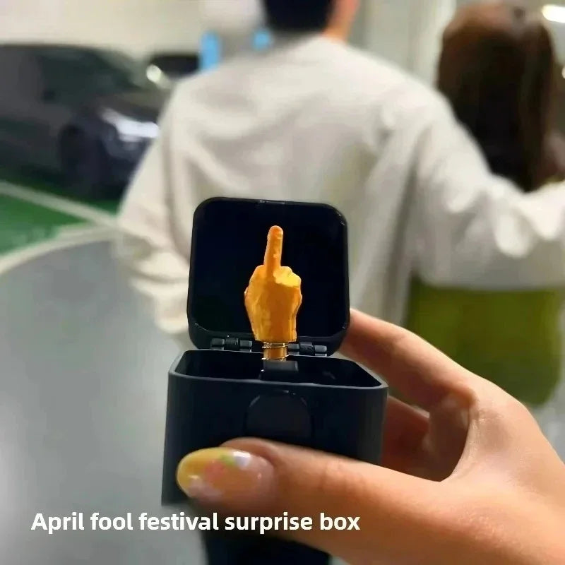 **Funny Middle Finger in Box - Hilarious Desk Decor & Gag Gift for Office, Halloween & Christmas**  (87 characters)